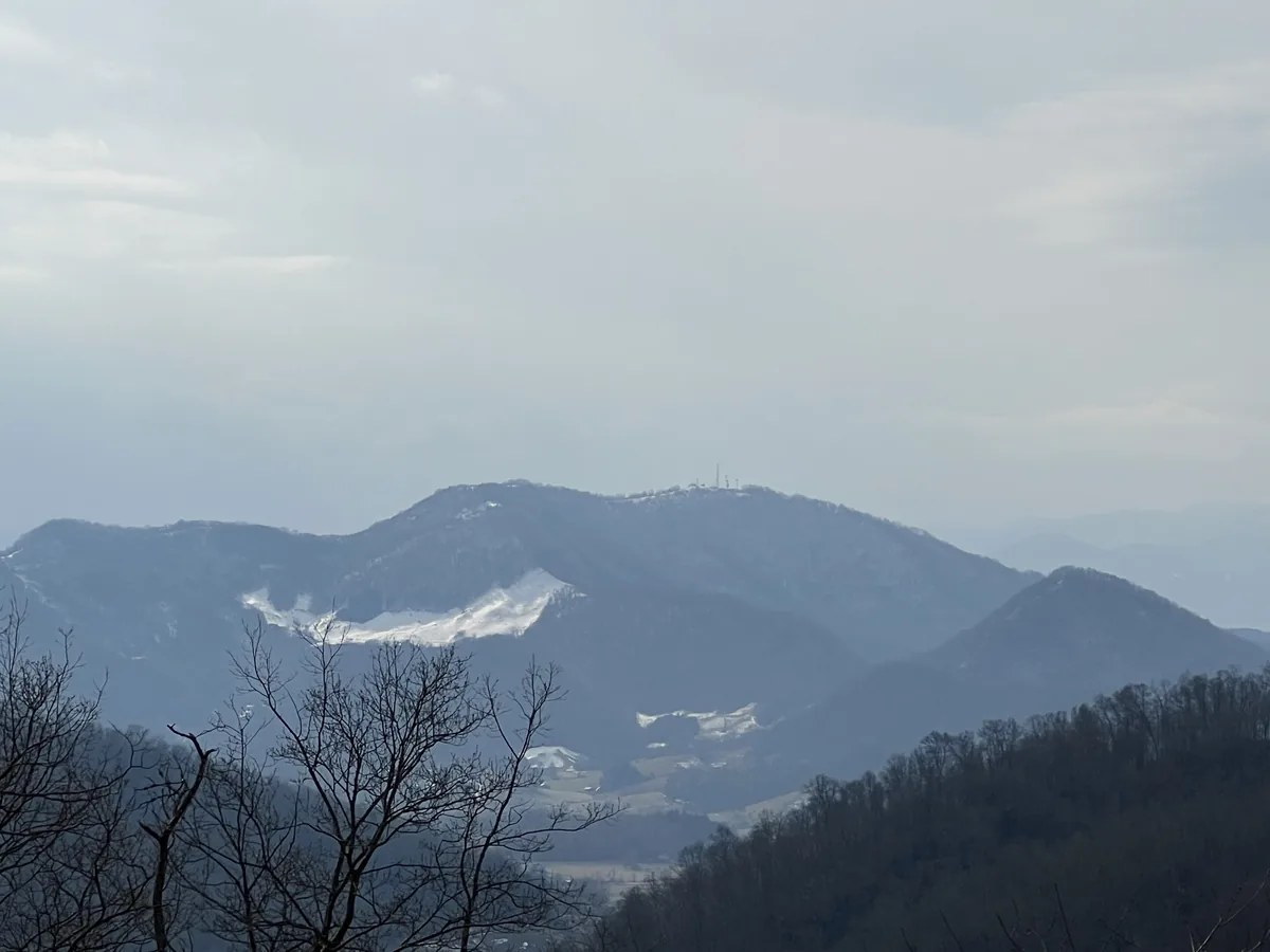 Layered winter mountain ridges in Haywood County
